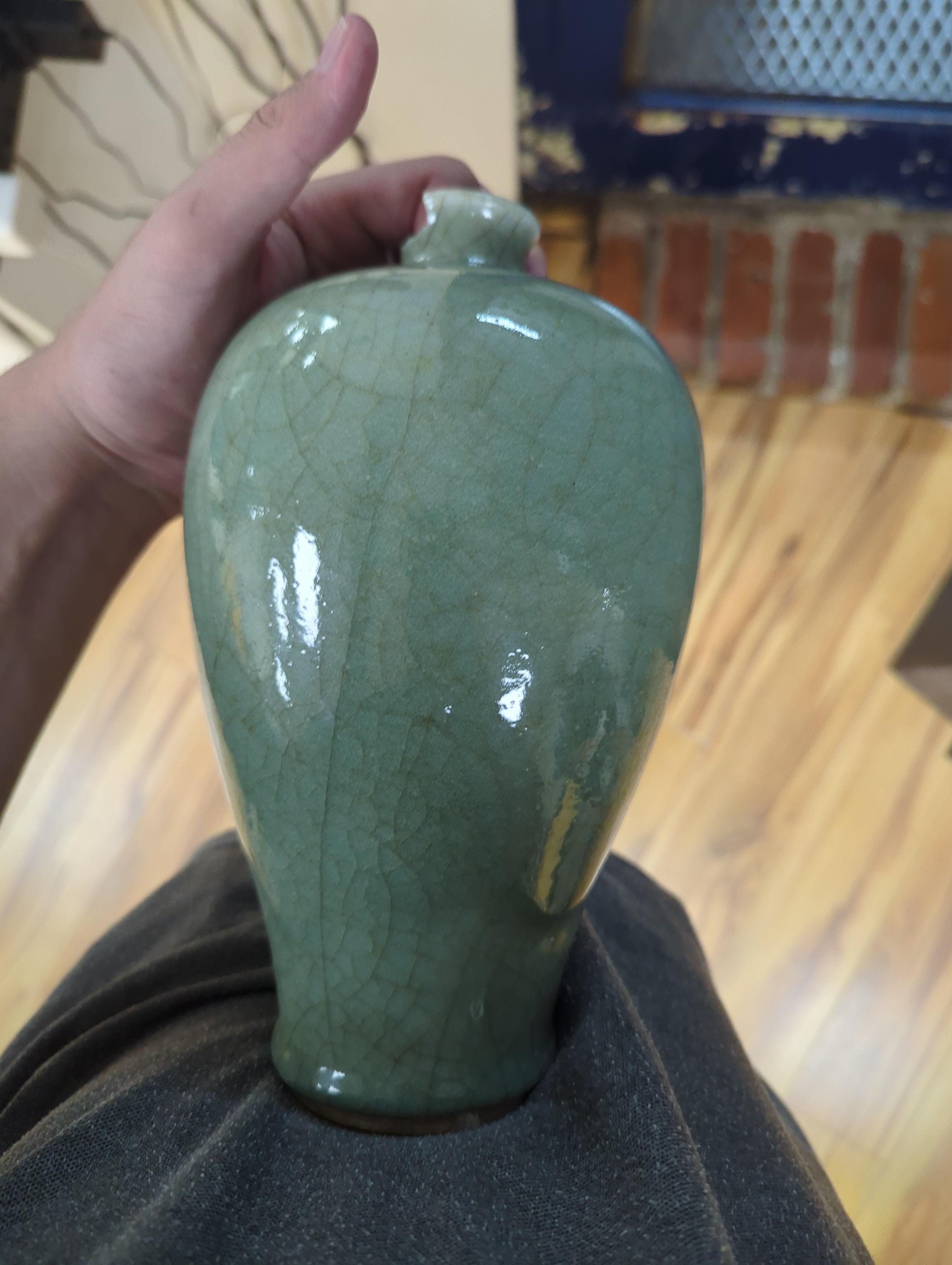 A Chinese celadon crackle glazed vase, 24cm